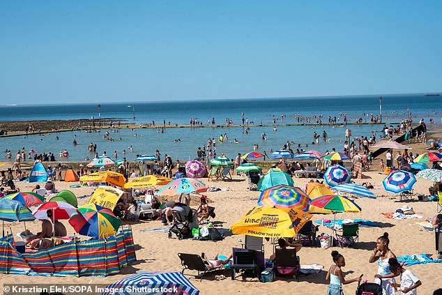 Experts warn cold showers trap heat; lukewarm water cools better.
