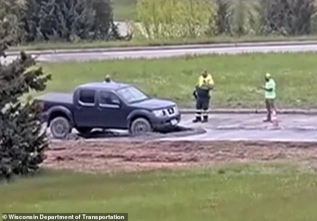 Wisconsin driver ignores road closure, gets stuck in concrete