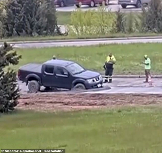Wisconsin driver ignores road closure, gets stuck in concrete