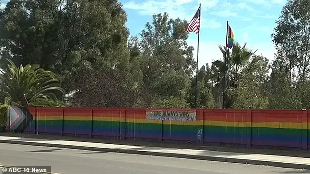 Lesbian woman discovers hateful teen group vandalizing her pride fence