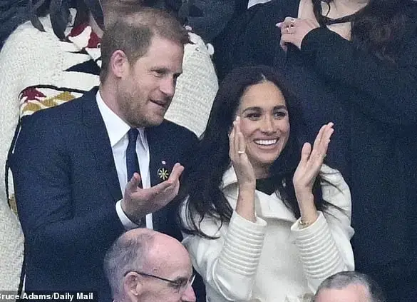 Meghan Markle and Prince Harry Share Passionate Kiss at Invictus Games