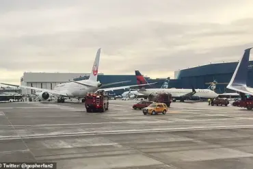 Scary collision at Seattle Airport: Japan Airlines jet hits Delta plane, cutting its tail.