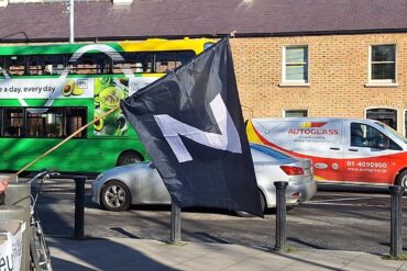 Truth & Neutrality Alliance Celebrates Second Anniversary with Protest at US Embassy in Dublin